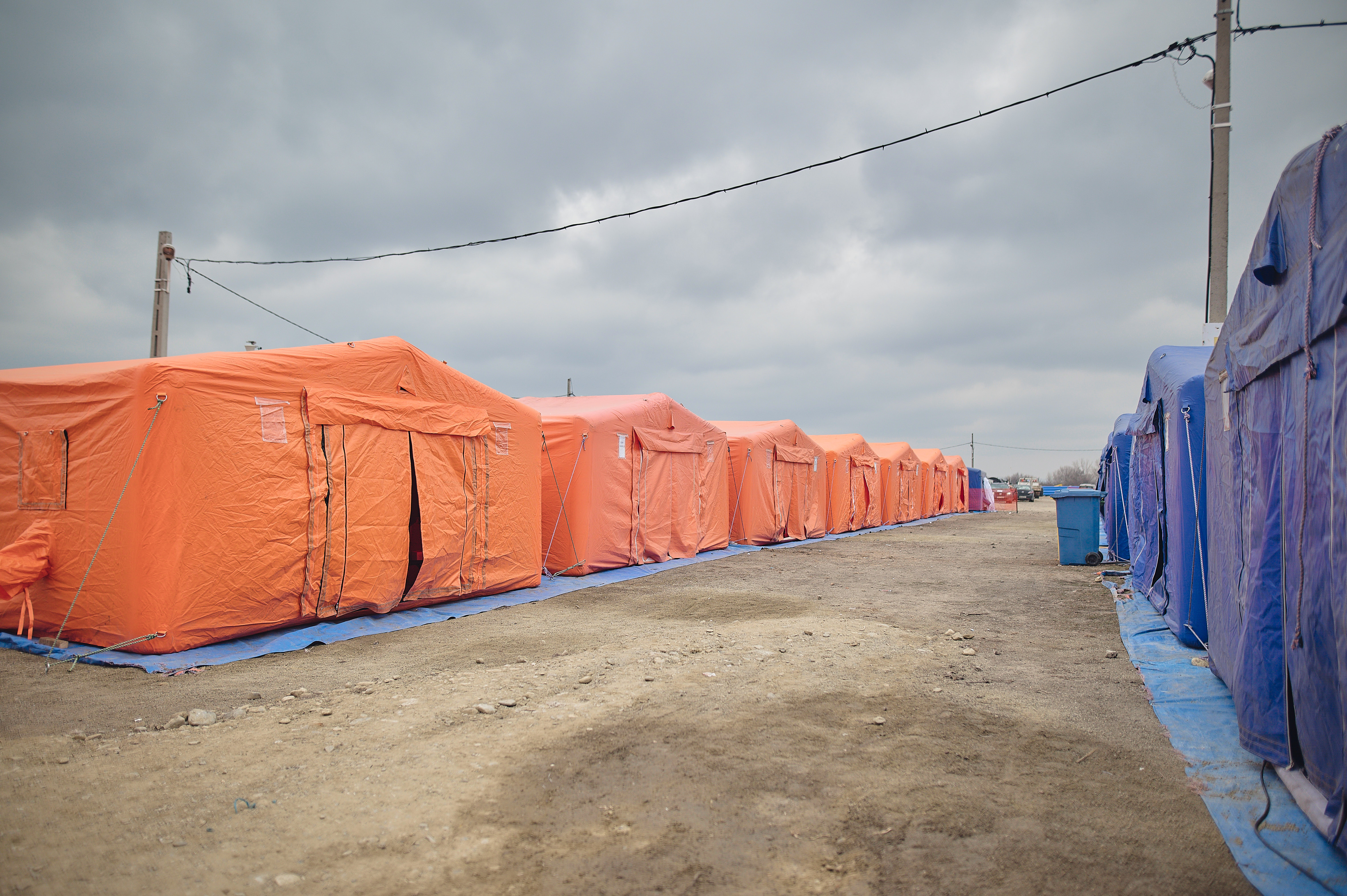 A row of pop up shelters